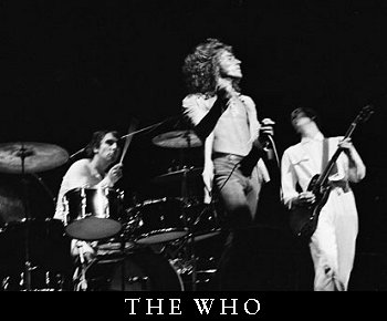 The Who, Keith Moon on drums, Roger Dalty on vocals, Pete Townsend on guitar. John Entwhislte, on bass, is not in the picture.